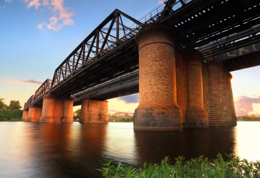The Victoria Bridge Penrith, view from waters edge at sunset.
